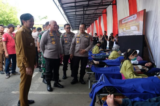 
 Peringati Hari Buruh Internasional, Polda Kalsel Gelar Bakti Sosial dan Kesehatan