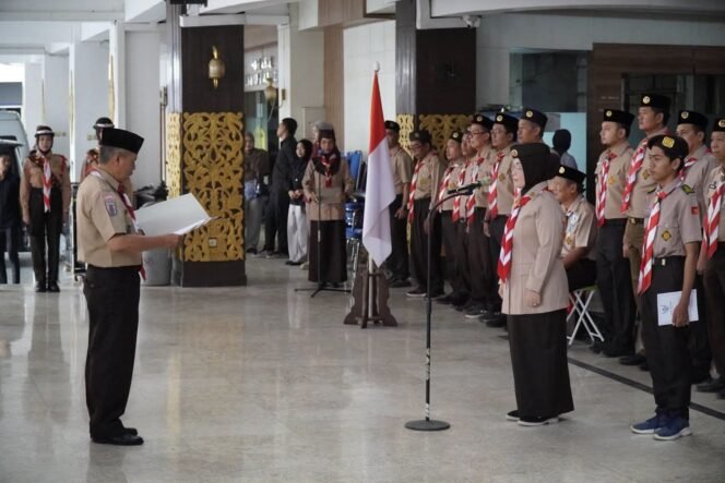 
 Ketua Kwarcab Banjarmasin Tekankan Karakter Urang Banjar saat Lepas Kontingen Jamnas XII